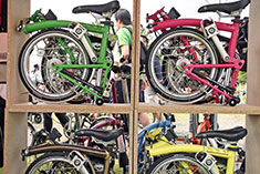 Brompton bicycles are compact and sold in a range of colours.