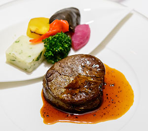 The main course was roast beef tenderloin and truffle sauce.